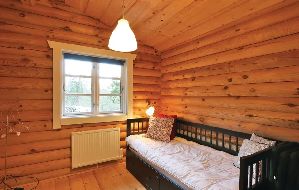The bedroom with the black bed frame